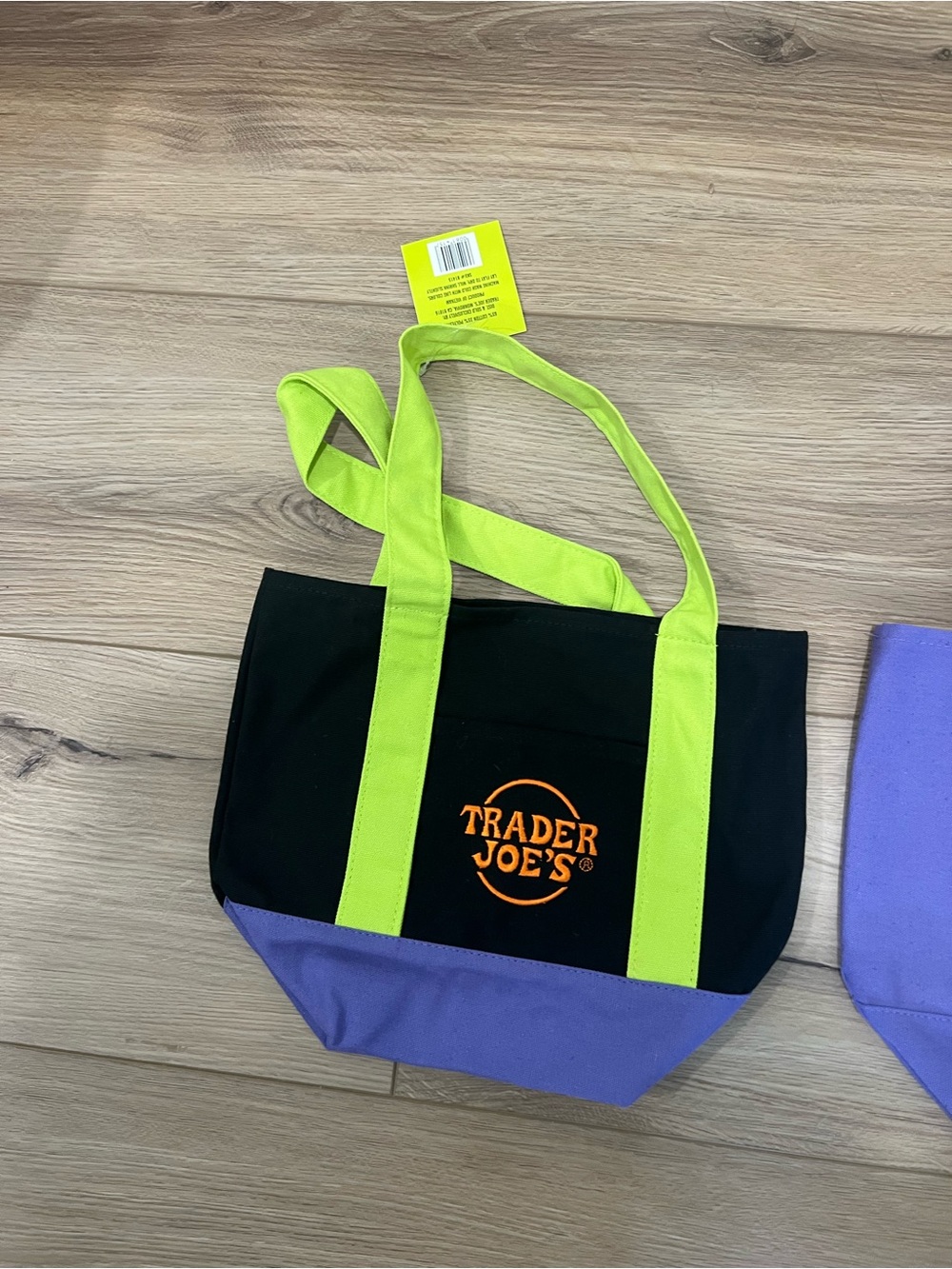 Trader Joe’s Black Orange  & Lime green Canvas Tote with Purple Base
